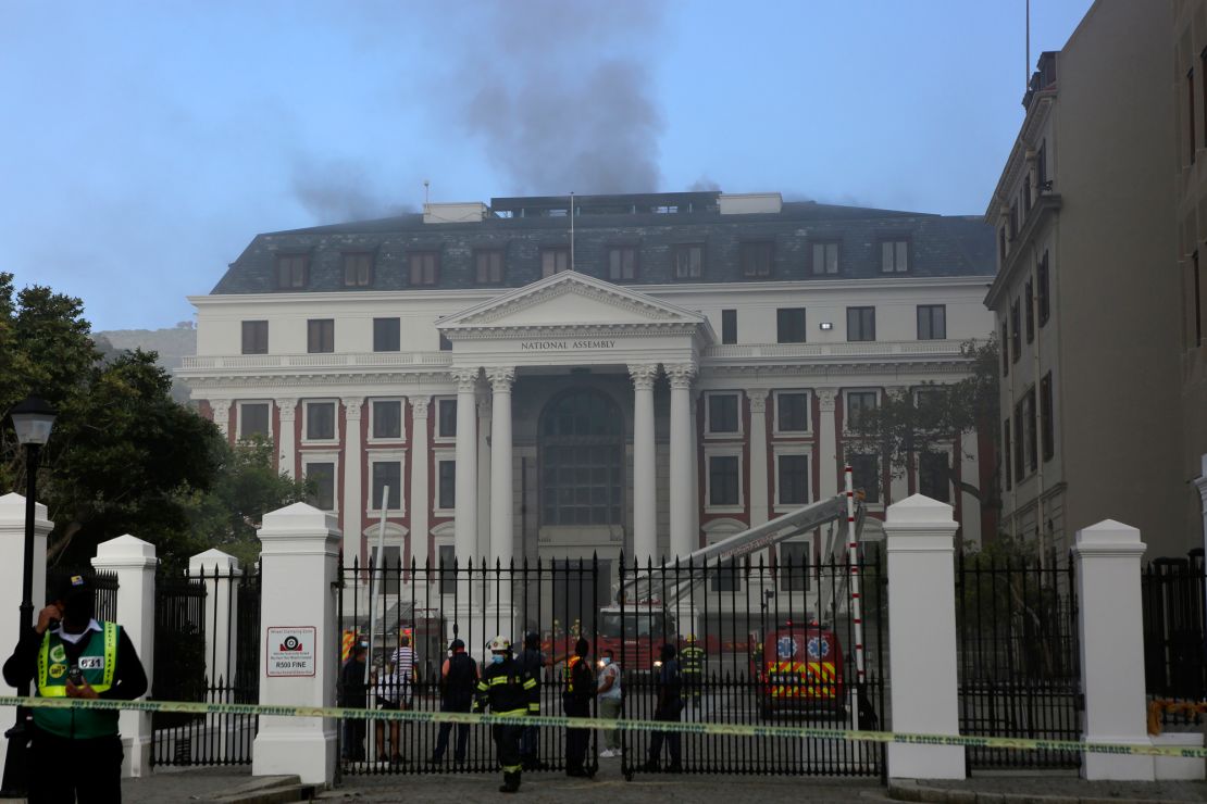 Firefighters battle the fire at South Africa's Parliament on Sunday.