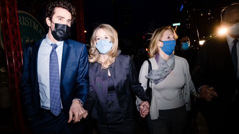 Elizabeth Holmes walks outside of federal court after she was found guilty on 4 of 11 accounts faced in her fraud trial in San Jose, California, January 3, 2022.