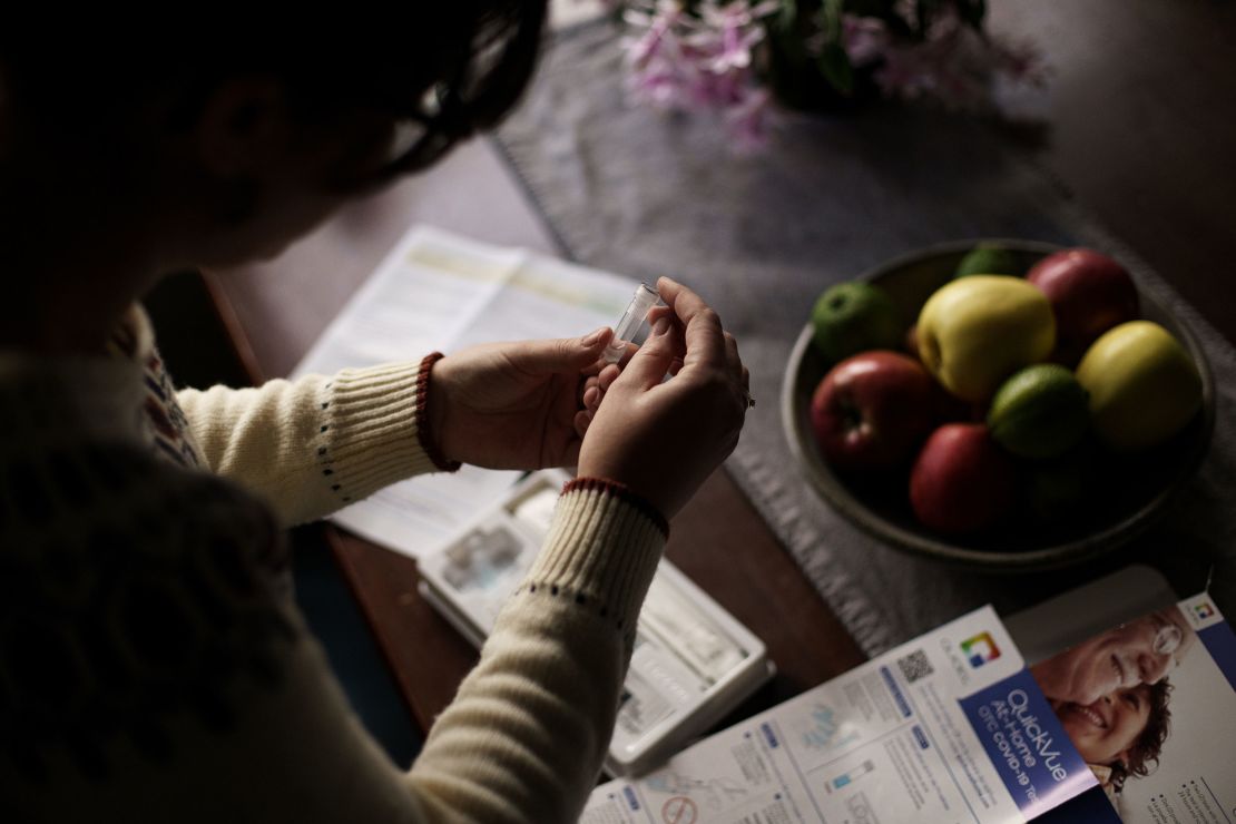 An Easton, New Hampshire, resident prepares to take a Covid-19 self-test on December 7, 2021.