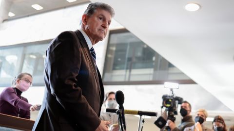 Sen. Joe Manchin speaks to reporters outside his office on Capitol Hill on Tuesday, January 4, 2022.