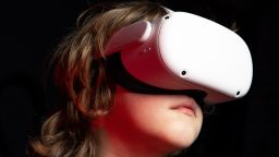 Child wearing an Oculus Quest 2 VR head set.