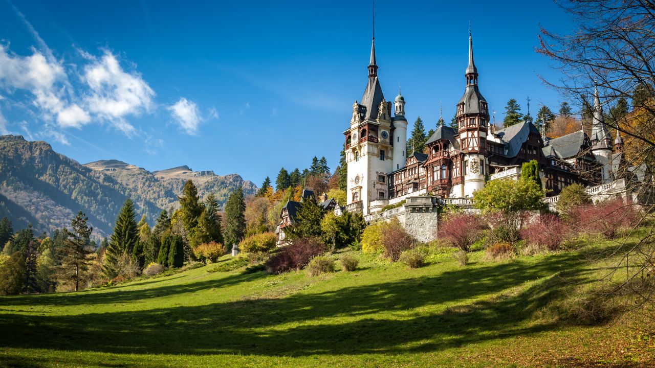 A view of Peleș Castle in Sinaia, Romania. This Eastern European nation was moved down to Level 3 on Monday.