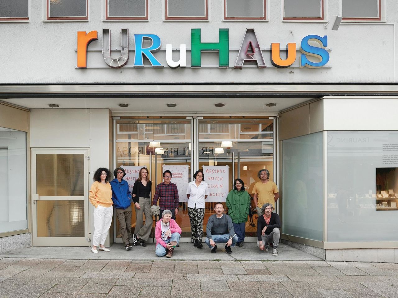 Indonesian arts collective Ruangrupa with members of the Documenta team.