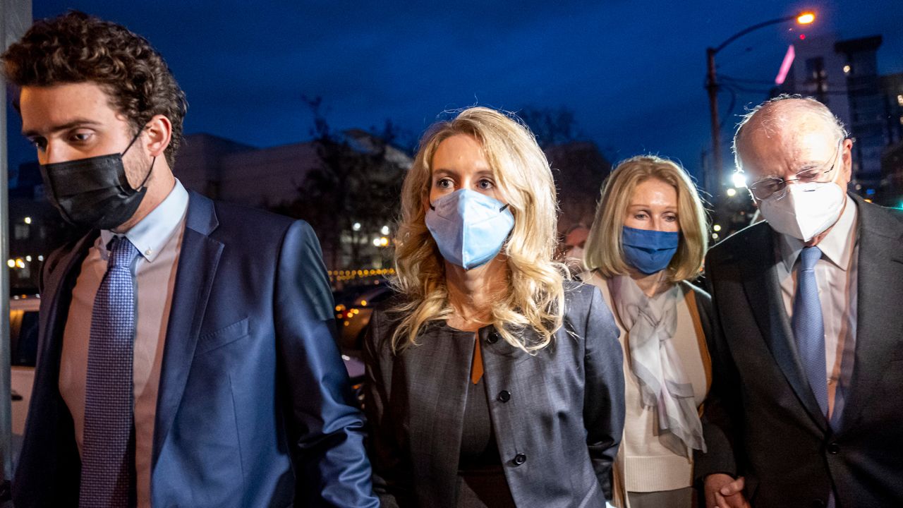 Elizabeth Holmes, founder of Theranos Inc., left center, departs from federal court with, from left, husband Billy Evans, parents Noel Holmes and Christian Holmes IV in San Jose, California, U.S., on Monday, Jan. 3, 2022.