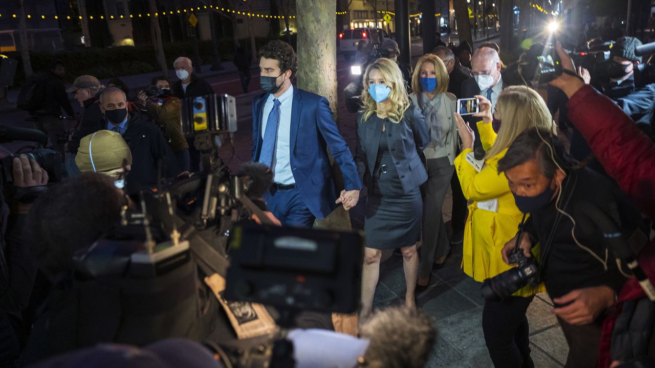 Elizabeth Holmes leaves federal court after the verdict in San Jose, California, on Monday, Jan. 3, 2022.