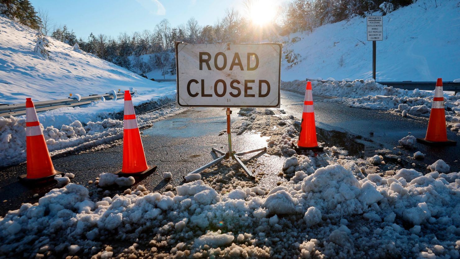 The entrance ramp to I-95 is closed after a winter storm dumped a foot of snow on the area overnight on January 4, 2022, near Fredericksburg in Stafford County, Virginia. 
