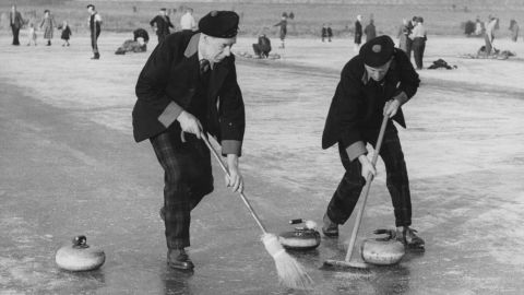 Two Blair Atholl curlers taking part in a curling 'Grand Match' of the Royal Caledonian Curling Club on Loch Leven, Kinross, Scotland on January 28, 1959.