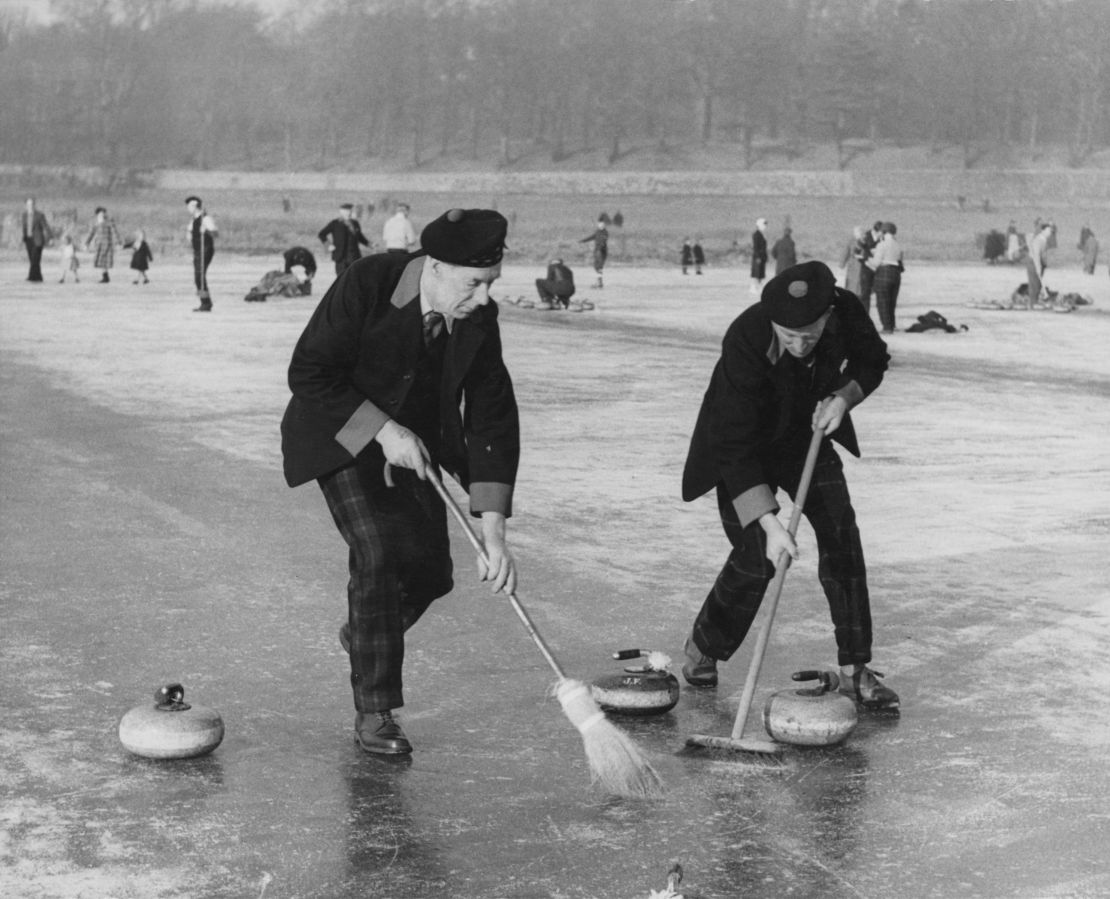 Two Blair Atholl curlers taking part in a curling 'Grand Match' of the Royal Caledonian Curling Club on Loch Leven, Kinross, Scotland on January 28, 1959.