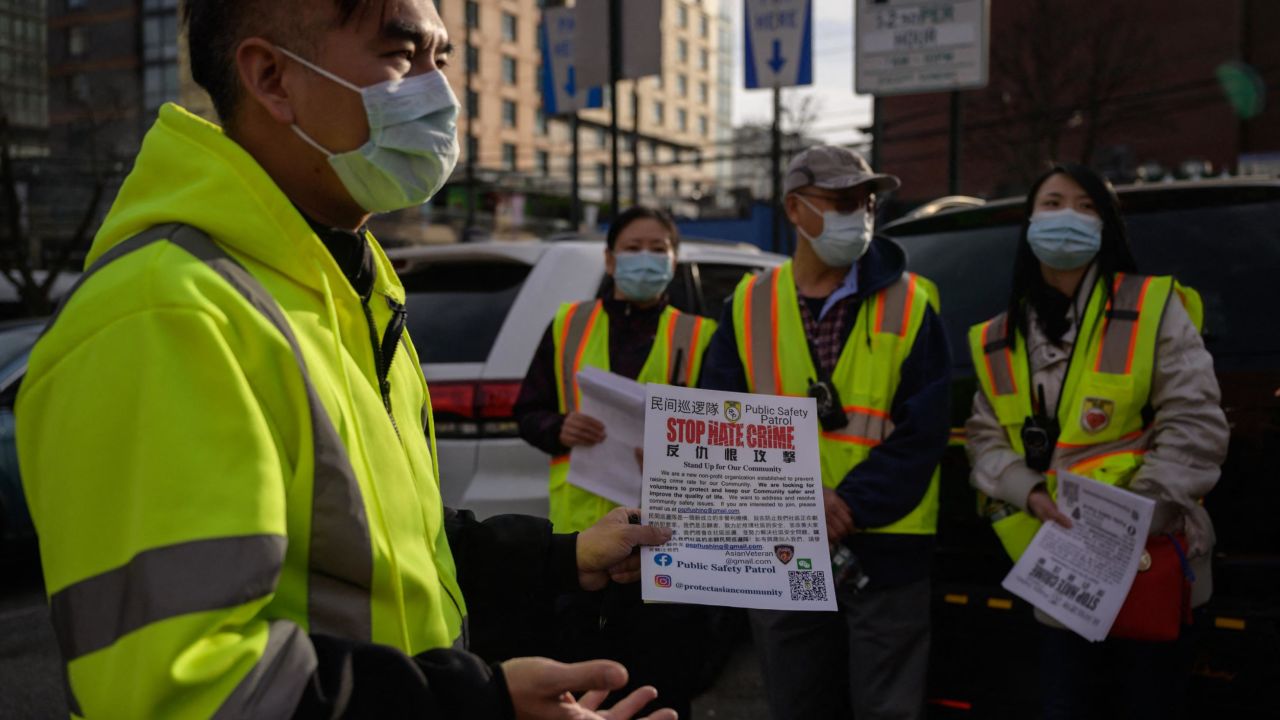 A volunteer anti-hate crime group prepares for a patrol in Flushing, New York, in March 2021.