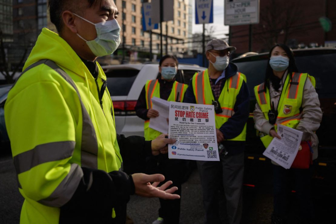 A volunteer anti-hate crime group prepares for a patrol in Flushing, New York, in March 2021.