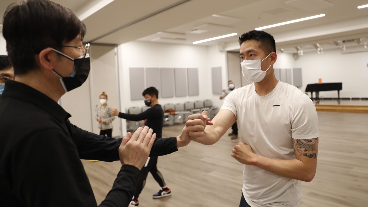 Members of a volunteer anti-hate crime group take part in a self-defense class in New York in April 2021.