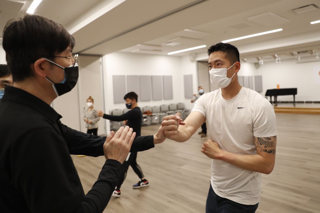 Members of a volunteer anti-hate crime group take part in a self-defense class in New York in April 2021.