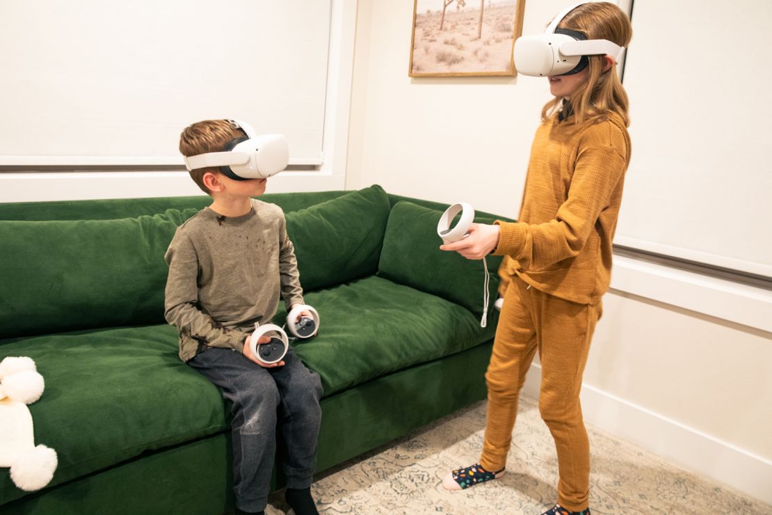 Cooper Albrecht, 8, and Rylee Albrecht, 10, play with their new Oculus Quest 2 headsets that they purchased in December using Christmas money.