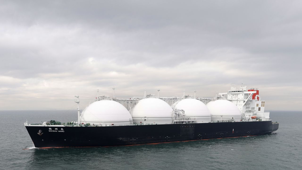 The liquefied natural gas tanker Sohshu Maru approaches a thermal power station in Japan. 