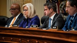 Vice Chair Liz Cheney, flanked by Chairman Bennie Thompson, and Rep. Adam Kinzinger, speaks as the House committee investigating January 6 meets on October 19, 2021 in Washington, DC. 
