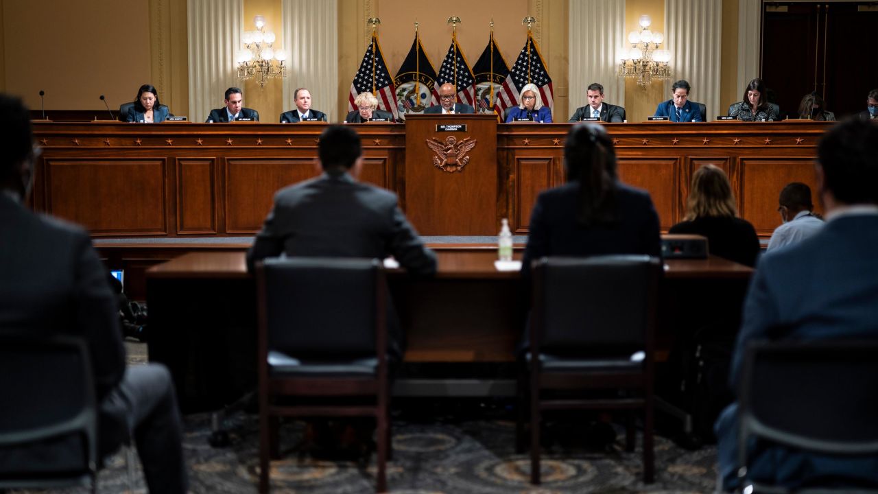 Chairman Bennie Thompson, D-Miss., speaks with Vice Chair Liz Cheney, R-Wyo., by his side as the House committee investigating January 6 meets on October 19, 2021. 