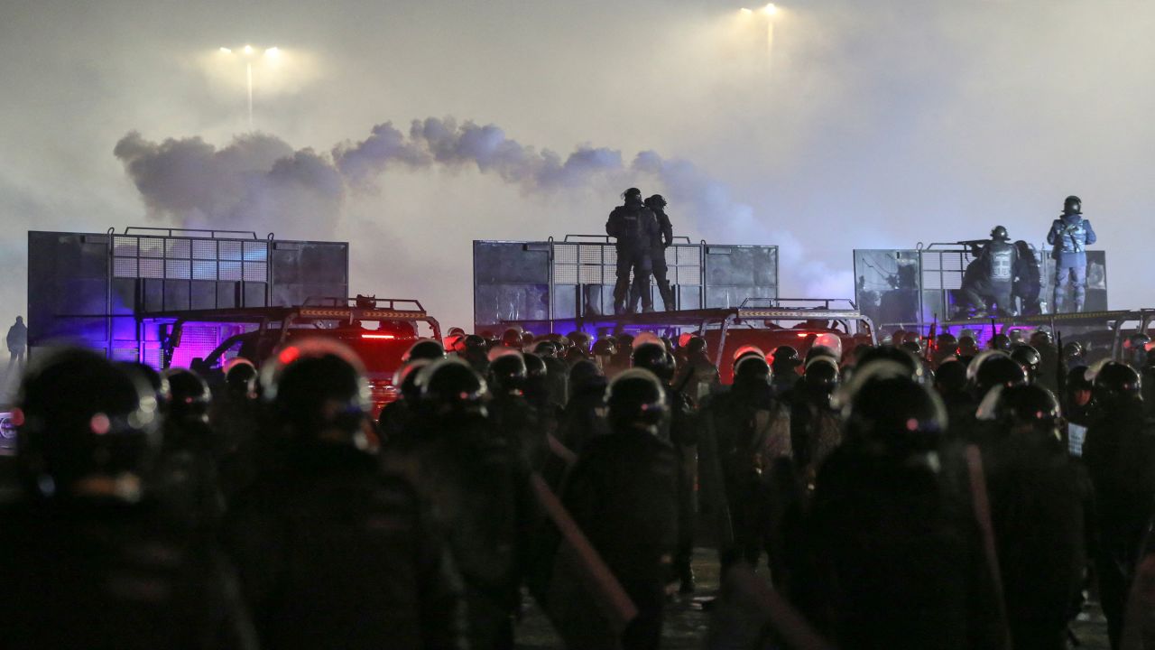 Officers at a protest in Almaty on January 4.