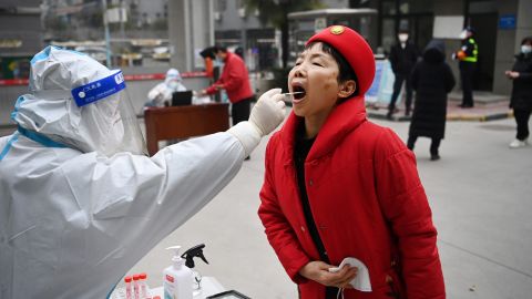 A resident receives a nucleic acid test in Xi'an, China, on January 4. 