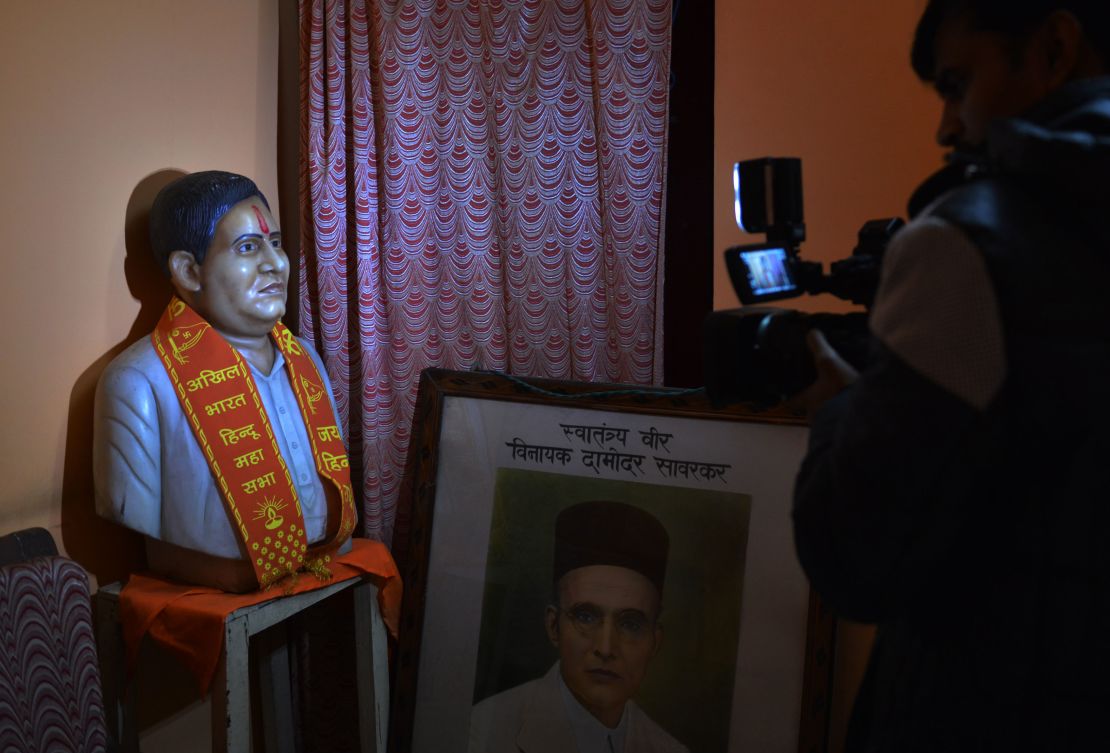 Nathuram Godse's statue is adroned with a garland at the Hindu Mahasabha office in New Delhi.