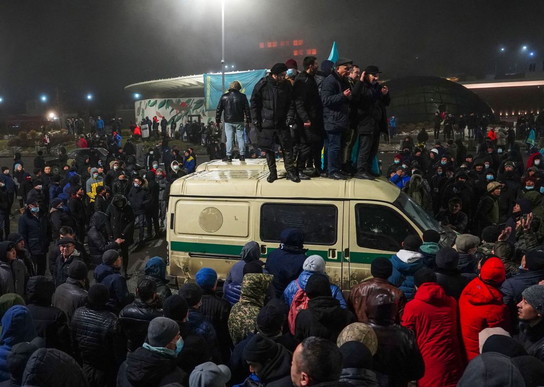 Protesters take part in a rally over a hike in energy prices in Almaty on January 5, 2022.