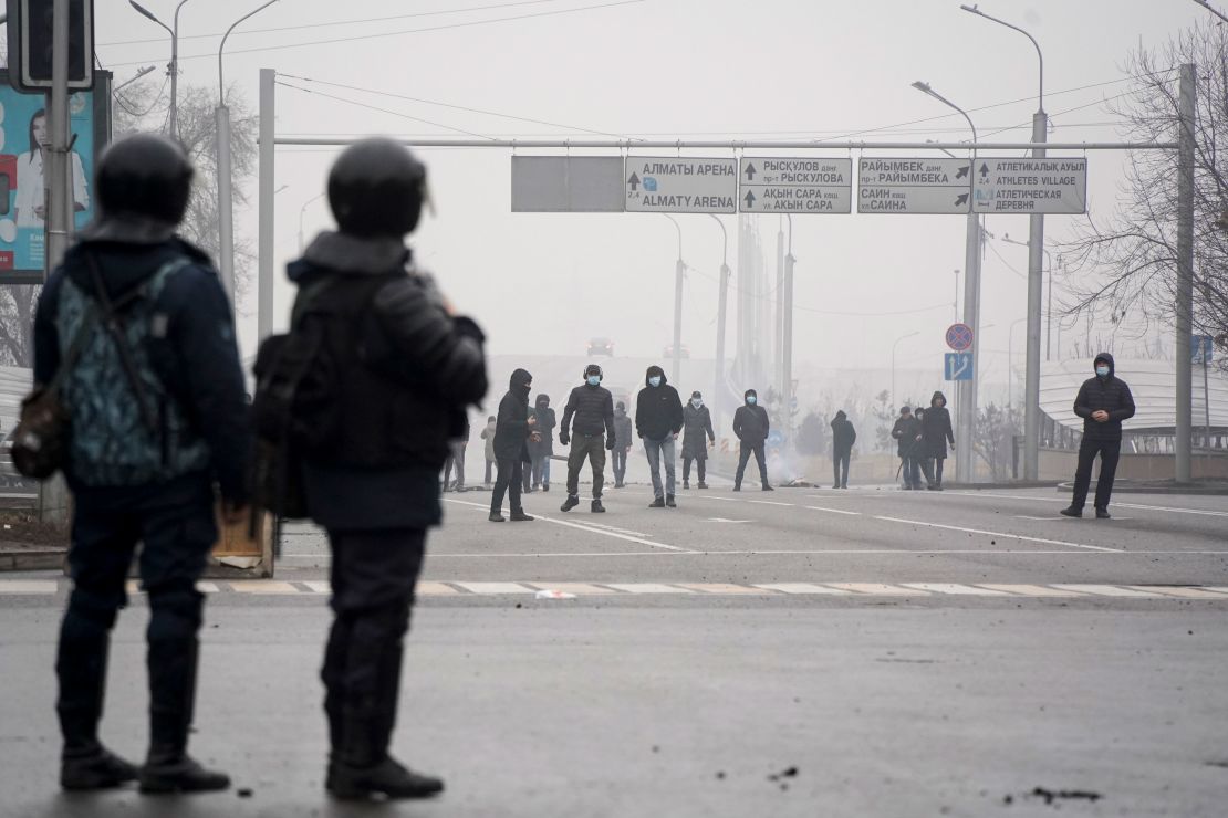 Demonstrators gather in front of police line during a protest in Almaty, Kazakhstan, on January 5.