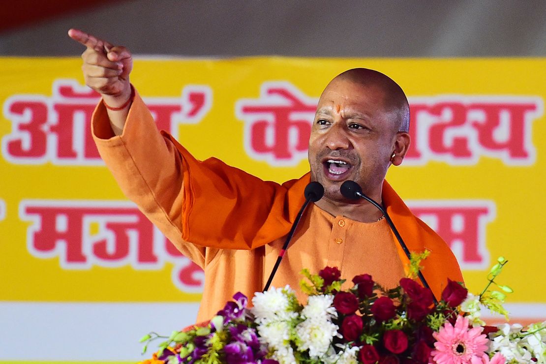 The chief minister of India's Uttar Pradesh state Yogi Adityanath addresses a public rally in Allahabad on December 26, 2021. 