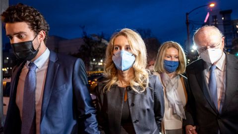 Elizabeth Holmes, founder of Theranos Inc., left center, departs from federal court with, from left, husband Billy Evans, parents Noel Holmes and Christian Holmes IV in San Jose, California, U.S., on Monday, Jan. 3, 2022.