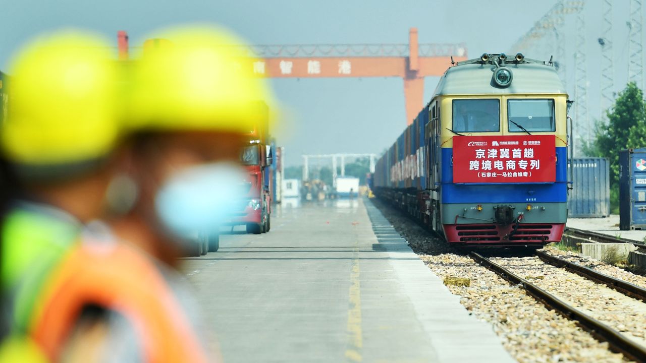 A train carrying 50 containers departs from China's Shijiazhuang International Land Port to Malaszewicze port in Poland on September 9, 2021.