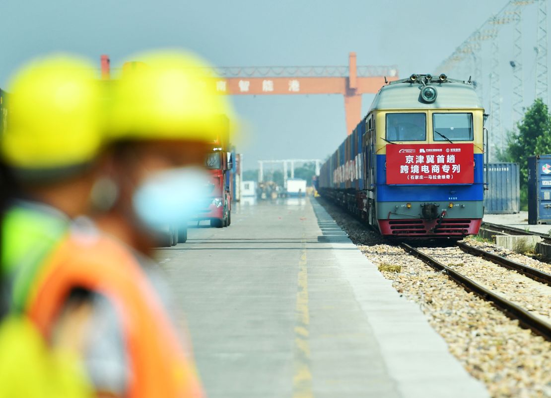 A train carrying 50 containers departs from China's Shijiazhuang International Land Port to Malaszewicze port in Poland on September 9, 2021.