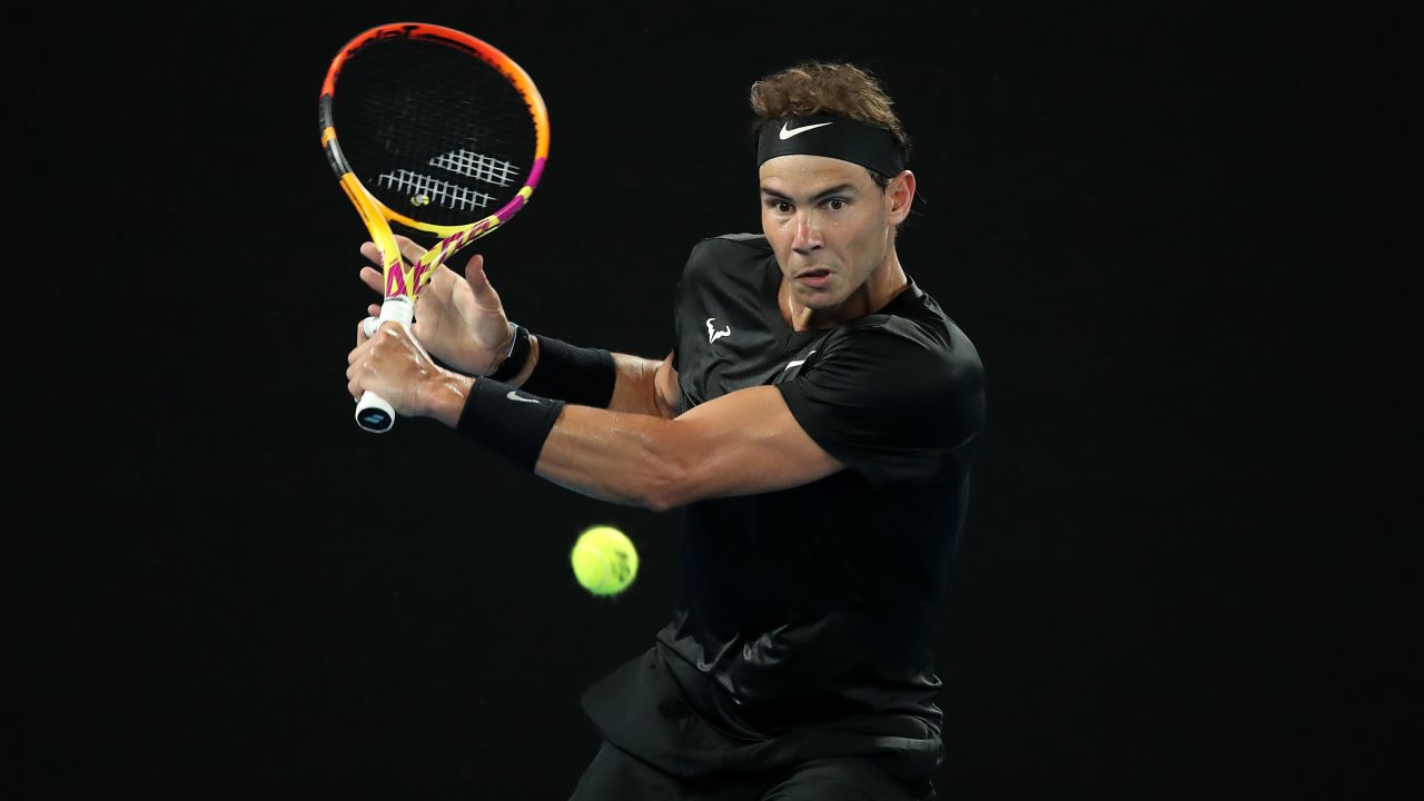Nadal plays a backhand in his victory against Ricardas Berankis on Thursday.