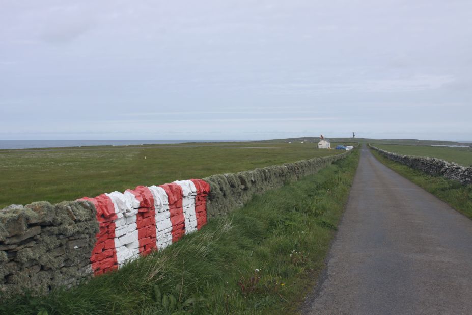 <strong>Runway's end: </strong>Stripes painted on a traditional dry stone wall serve as a navigational marker for one of Papa Westray's landing strips.