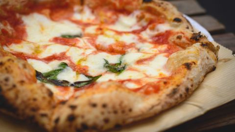 Hello, pizza margherita. Treating yourself on a weekly basis will keep you from obsessing over restricted foods. 