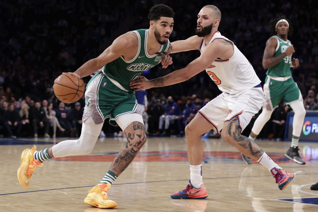 Celtics forward Jayson Tatum drives past Evan Fournier during the second half.