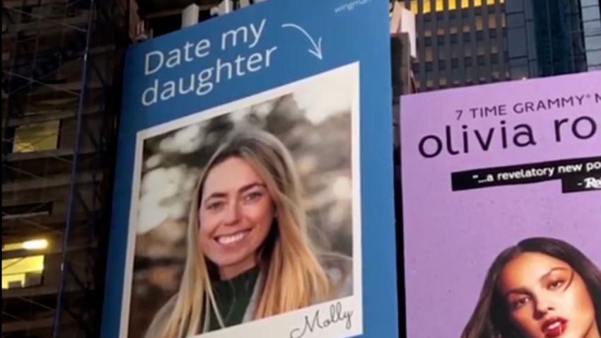 Beth Davis, with the help of the Wingman dating app, created this Times Square billboard for her daughter Molly.