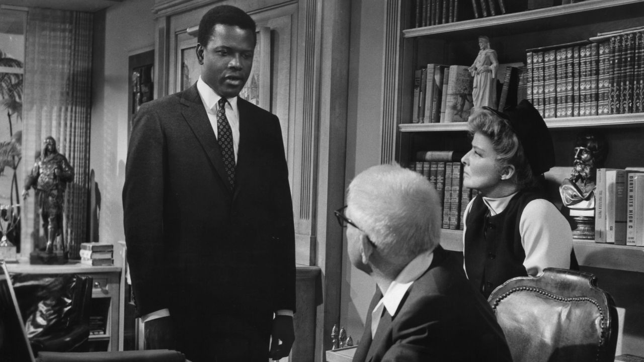 Sidney Poitier with Spencer Tracy and Katharine Hepburn in a scene from the 1967 film, "Guess Who's Coming To Dinner."