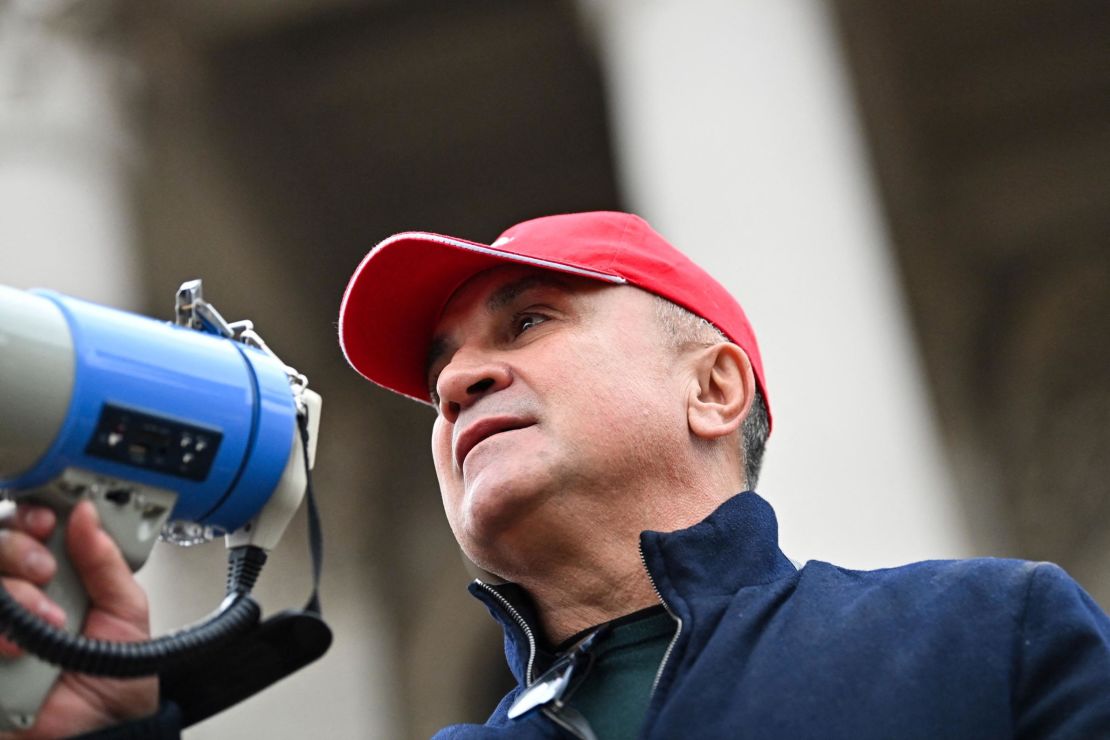 Srdan Djokovic addresses a rally in front of Serbia's National Assembly in Belgrade on Thursday.