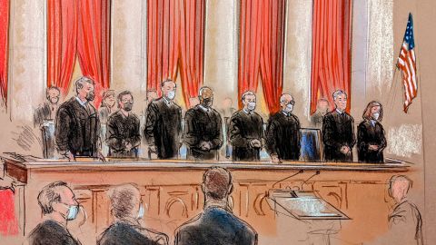 Supreme Court justices at oral arguments on January 7. Justice Neil Gorsuch is unmasked. Justice Sonia Sotomayor participated remotely. 