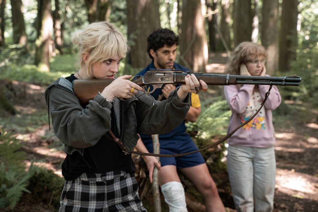 Sophie Thatcher as Teen Natalie, Steven Krueger as Ben Scott and Samantha Hanratty as Teen Misty in "Yellowjackets" 