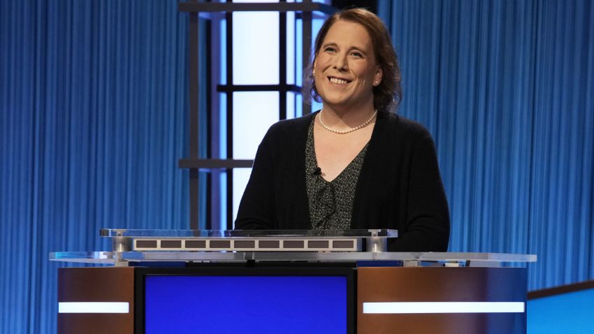 This image provided by Jeopardy Productions, Inc. shows game show champion Amy Schneider on the set of "Jeopardy!" Schneider is the first trans person to qualify for the show's Tournament of Champions. (Jeopardy Productions, Inc. via AP)