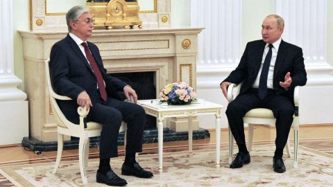 Russia's President Vladimir Putin speaks with Kazakhstan's President Kassym-Jomart Tokayev during their meeting in Moscow on August 21, 2021.
