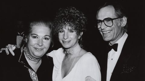 Marilyn Bergman, left, and her husband Alan Bergman, right, are seen with Barbra Streisand, center, in 1966.