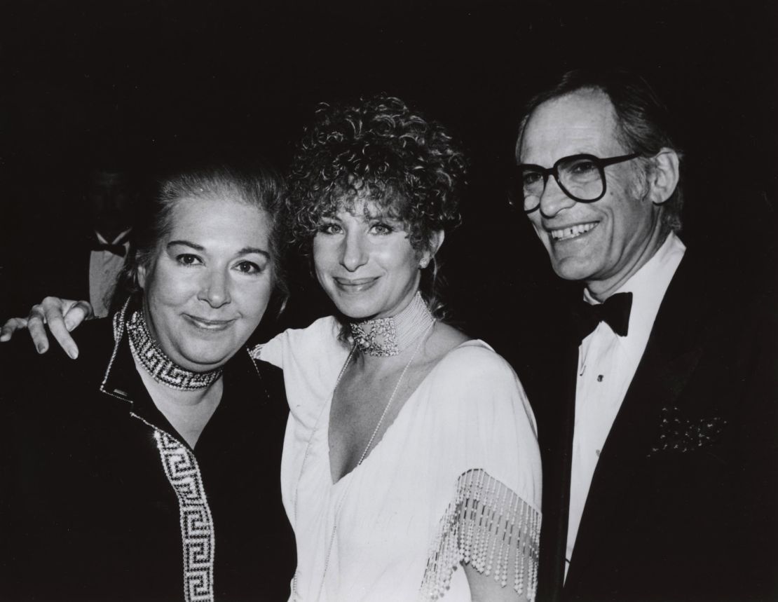 Marilyn Bergman, left, and her husband Alan Bergman, right, are seen with Barbra Streisand, center, in 1966.