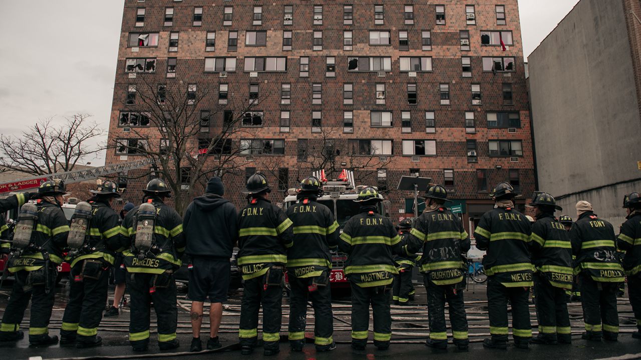 NEW YORK, NY - JANUARY 09: Emergency first responders remain at the scene after an intense fire at a 19-story residential building that erupted in the morning on January 9, 2022 in the Bronx borough of New York City. Reports indicate over 50 people were injured. (Photo by Scott Heins/Getty Images)