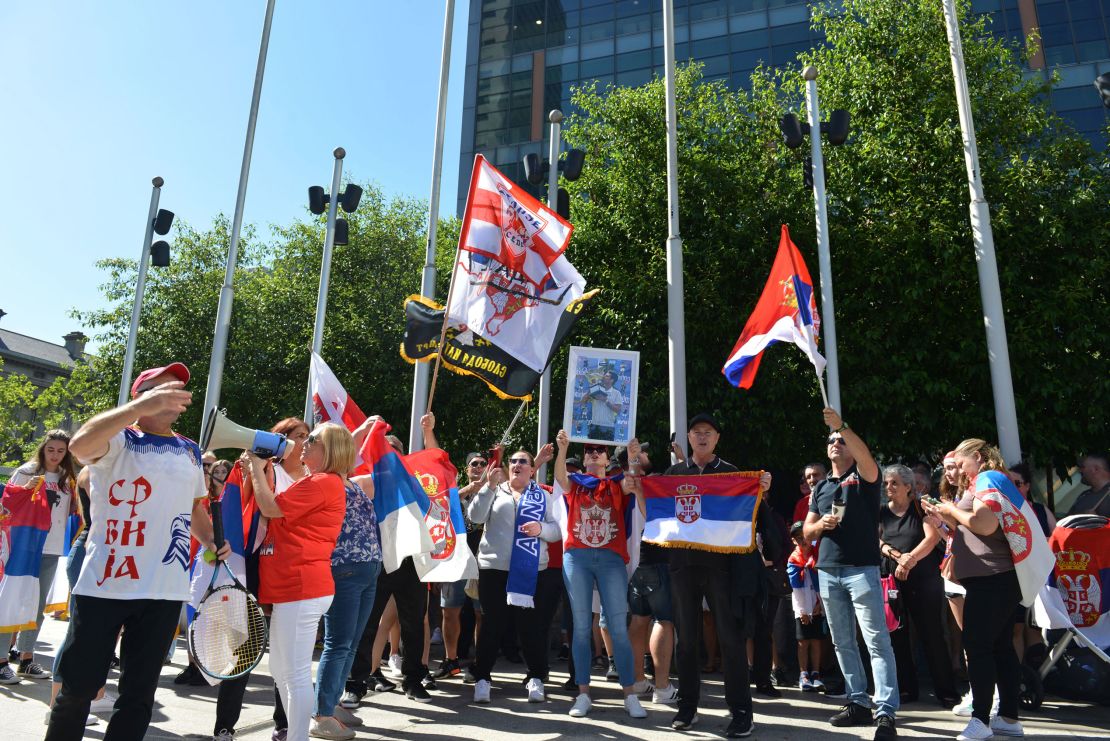 People are seen outside the Law Court building on January 10, 2022 in Melbourne, Australia. 