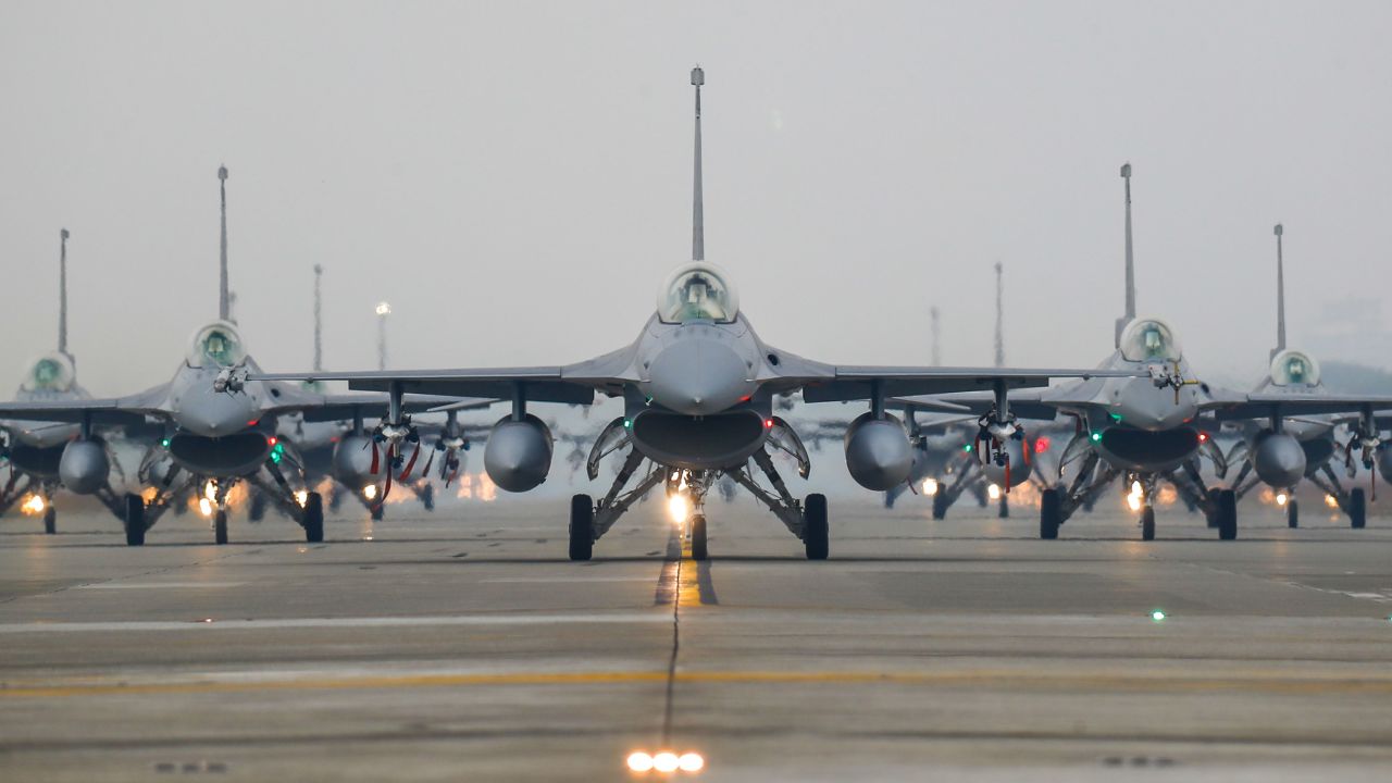 Taiwanese F-16V jet fighters taxi on the runway at Chiayi Air Base on January 5.