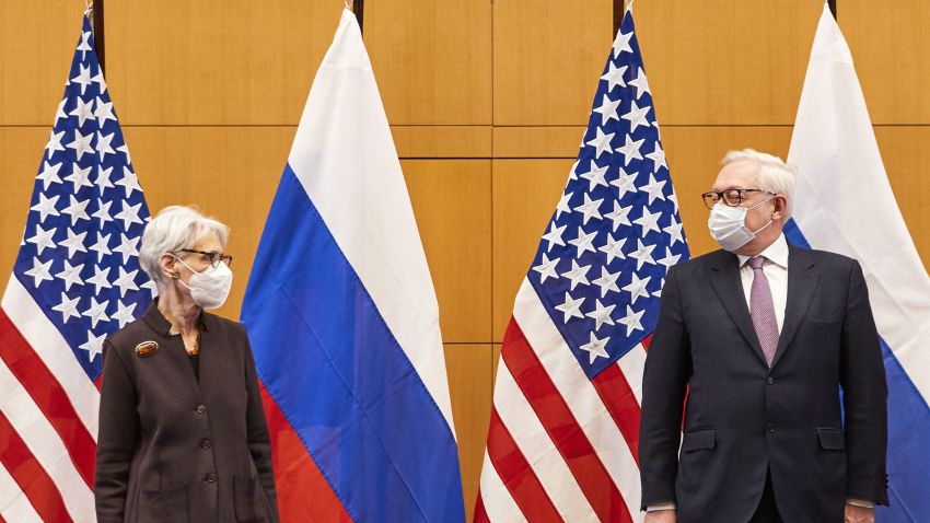 US Deputy Secretary of State Wendy Sherman (L) and Russian deputy Foreign Minister Sergei Ryabkov (R) pose for pictures as they attend security talks on soaring tensions over Ukraine, at the US permanent Mission, in Geneva, on January 10, 2022. - A top Russian official said he had a "difficult" conversation with his US counterpart on January 9, 2022 as preliminary talks on Ukraine got under way amid fears of a Russian invasion of its pro-Western neighbor. "The conversation was difficult, it couldn't have been easy," Russian Deputy Foreign Minister Sergei Ryabkov was quoted as saying by the Interfax news agency after meeting US Deputy Secretary of State Wendy Sherman during a working dinner in Geneva. (Photo by DENIS BALIBOUSE / POOL / AFP) (Photo by DENIS BALIBOUSE/POOL/AFP via Getty Images)