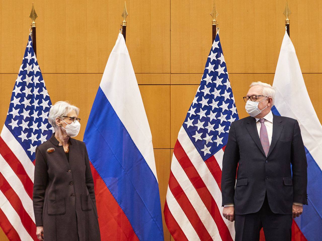 US Deputy Secretary of State Wendy Sherman (L) and Russian deputy Foreign Minister Sergei Ryabkov (R) pose for pictures as they attend security talks on soaring tensions over Ukraine at the US Permanent Mission in Geneva on January 10.