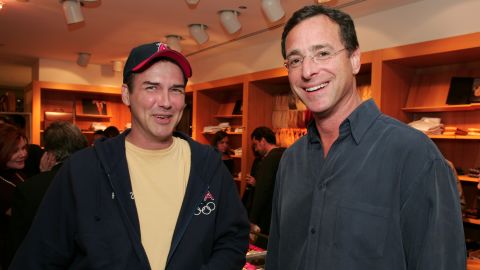 Norm Macdonald and Bob Saget at a book signing in Los Angeles, California in 2004. 