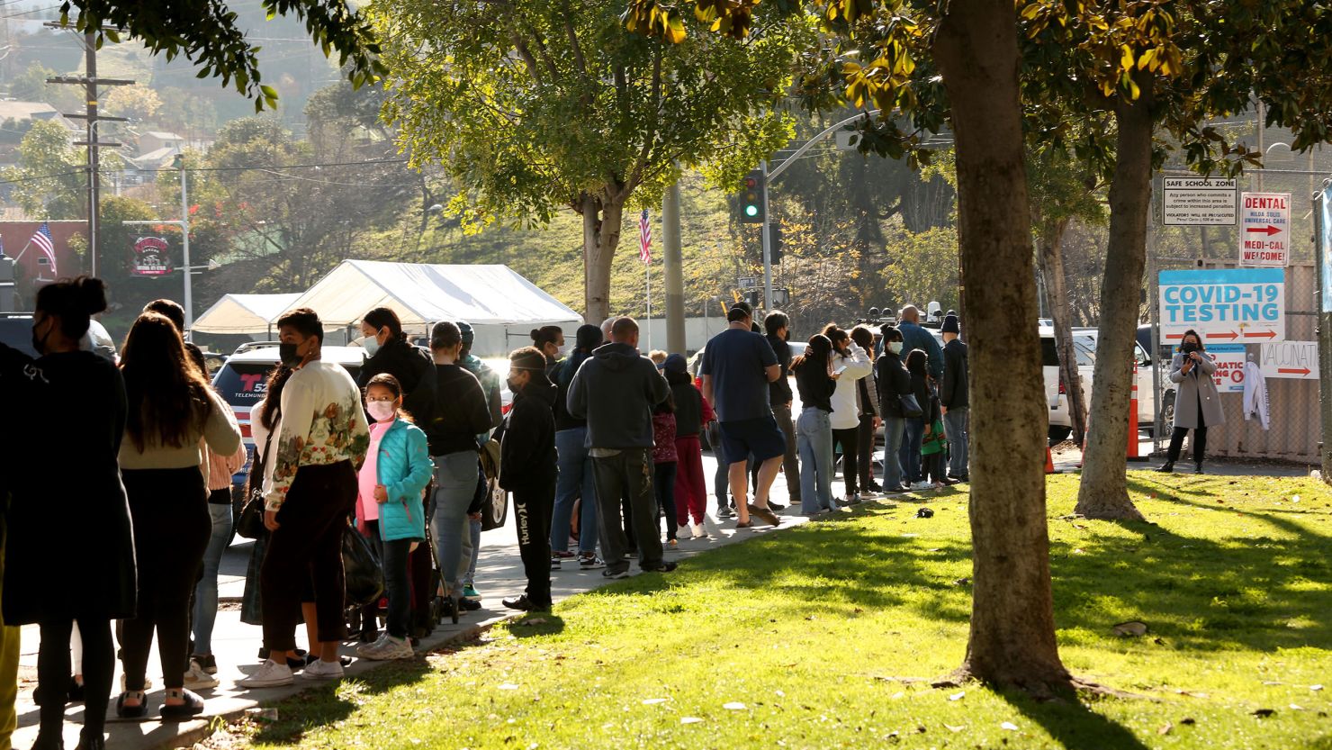 Students and staff wait in line for a Covid-19 test at a school in Los Angeles.