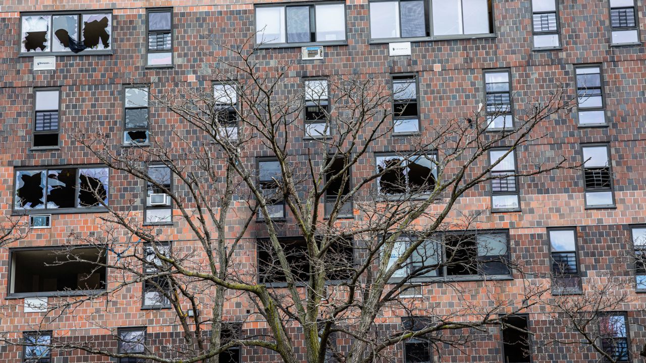 Broken windows are signs of the deadly fire which swept through this residential apartment building in the Bronx.